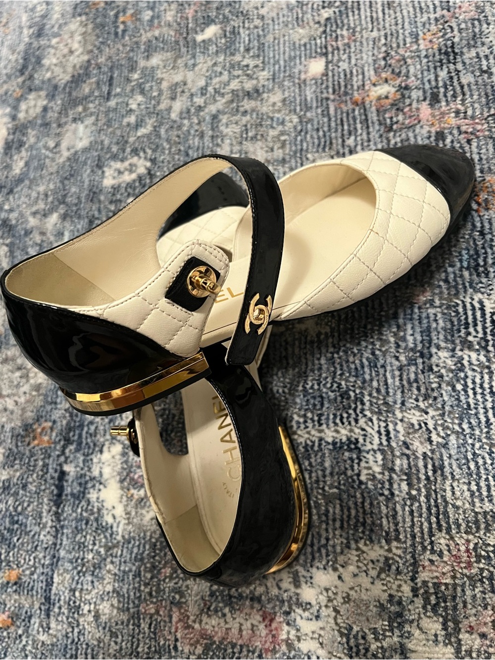CHANEL Black & Cream Quilted Mary Jane Flats with Gold CC Hardware